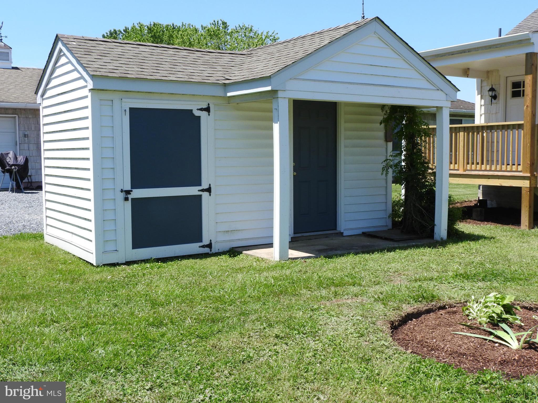 1540 Deep Point Road Woolford, MD 21677 - Photo 21 of 30 a view of a house with a yard