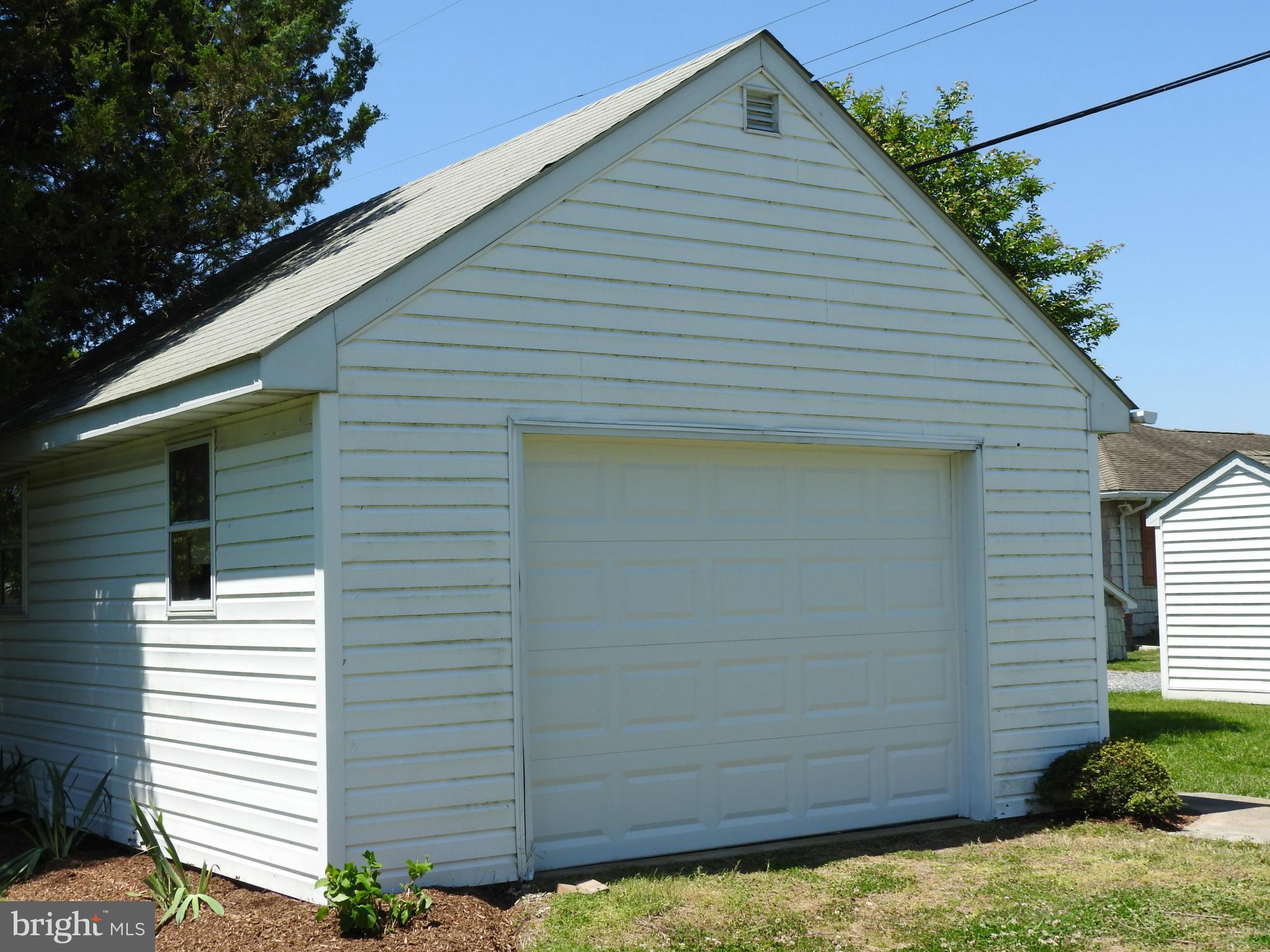 1540 Deep Point Road Woolford, MD 21677 - Photo 22 of 30 a view of a small house with garage