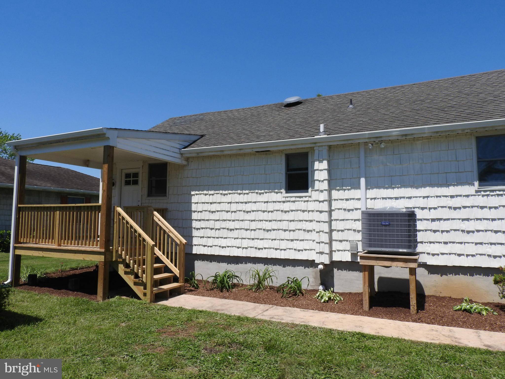 1540 Deep Point Road Woolford, MD 21677 - Photo 24 of 30 a view of a house with a large window