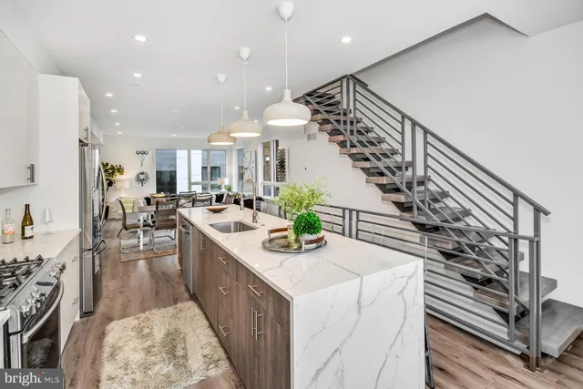 a kitchen with furniture and a stove