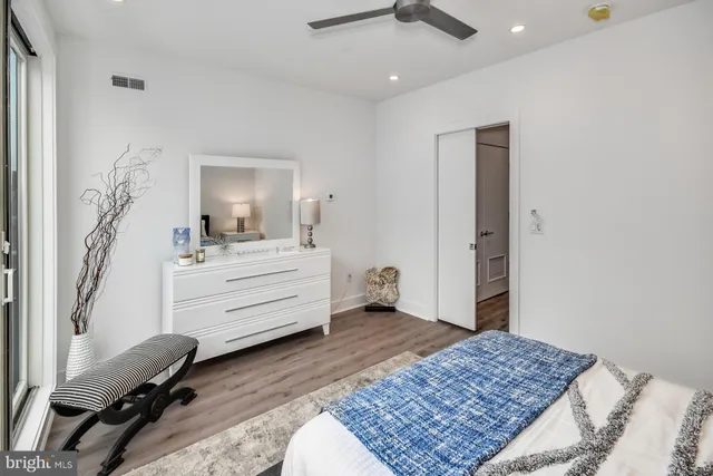 a room with a bed and furniture