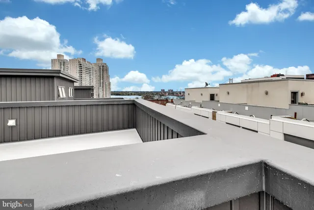 a terrace with a city view