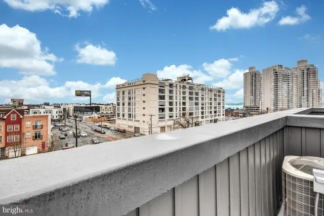 a view of city with tall buildings