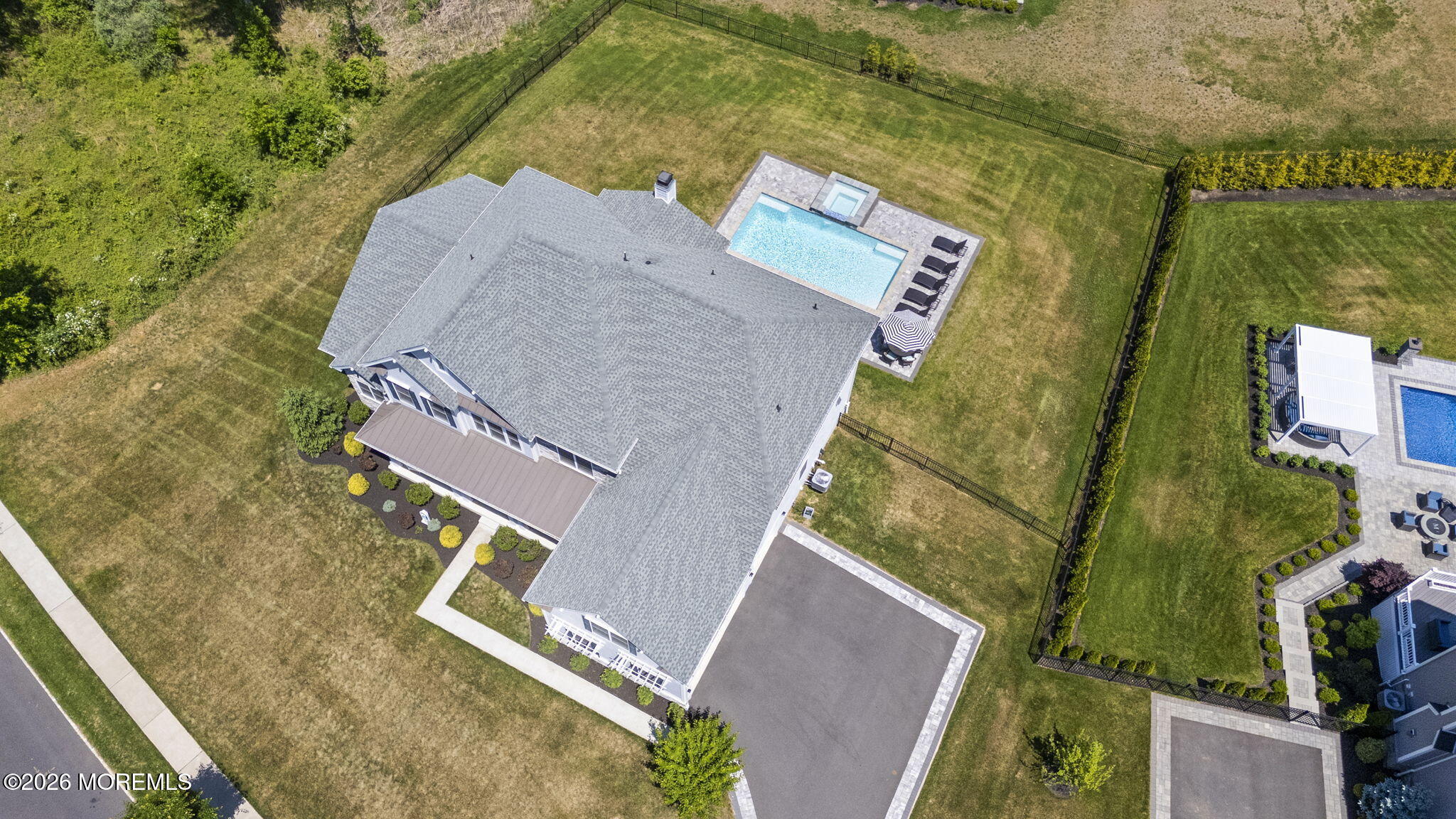 66 Windermere Road Lincroft, NJ 07738 - Photo 43 of 48 an aerial view of a house with a yard