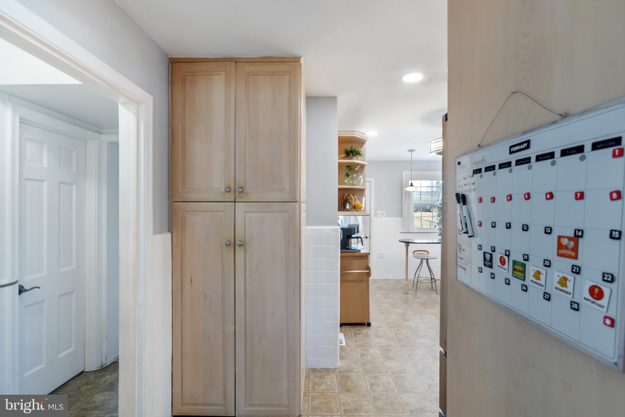 130 Johns Road Cheltenham, PA 19012 - Photo 15 of 50 a view of kitchen with refrigerator and white cabinets