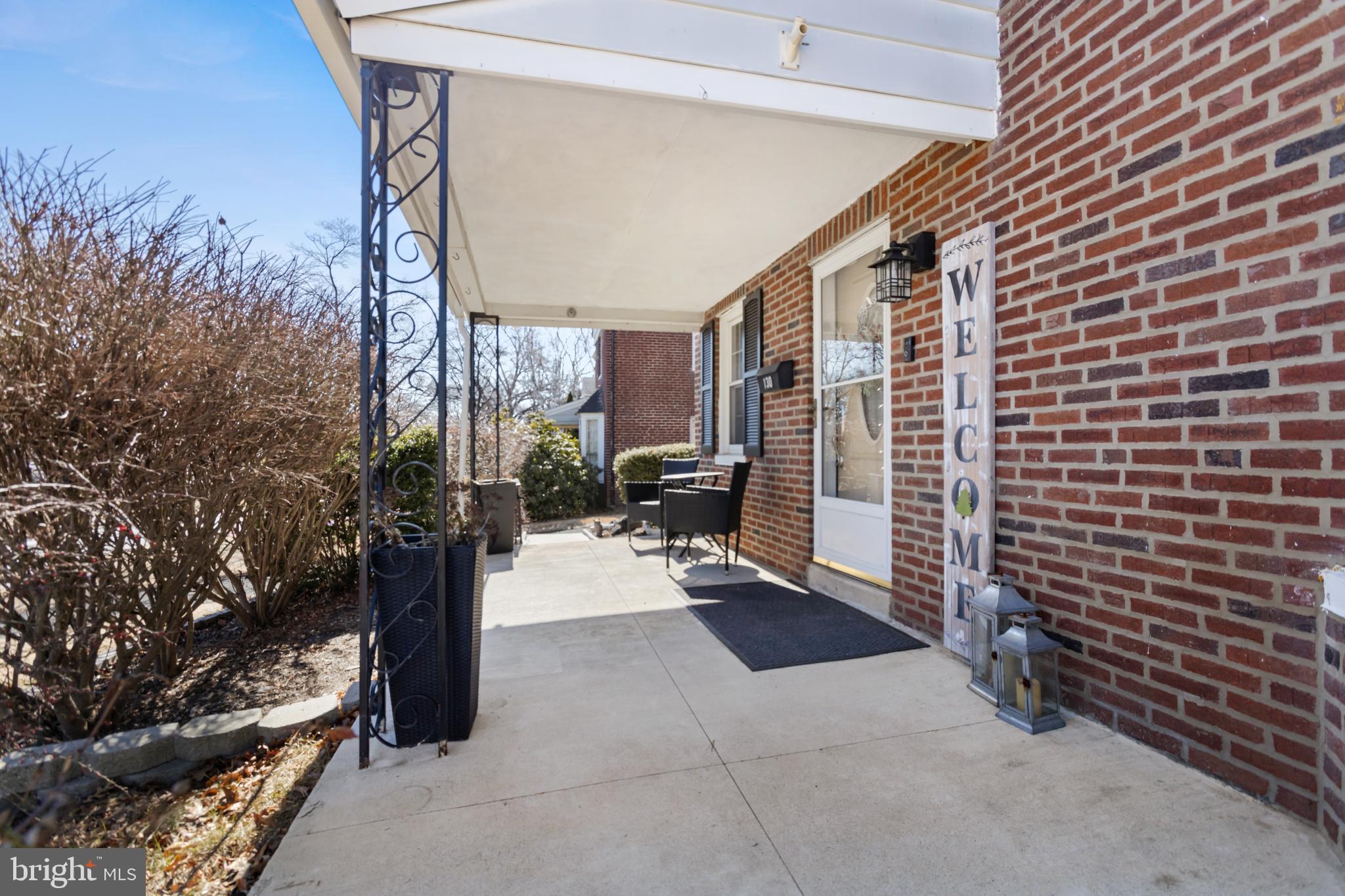 130 Johns Road Cheltenham, PA 19012 - Photo 2 of 50 a backyard of a house with seating space