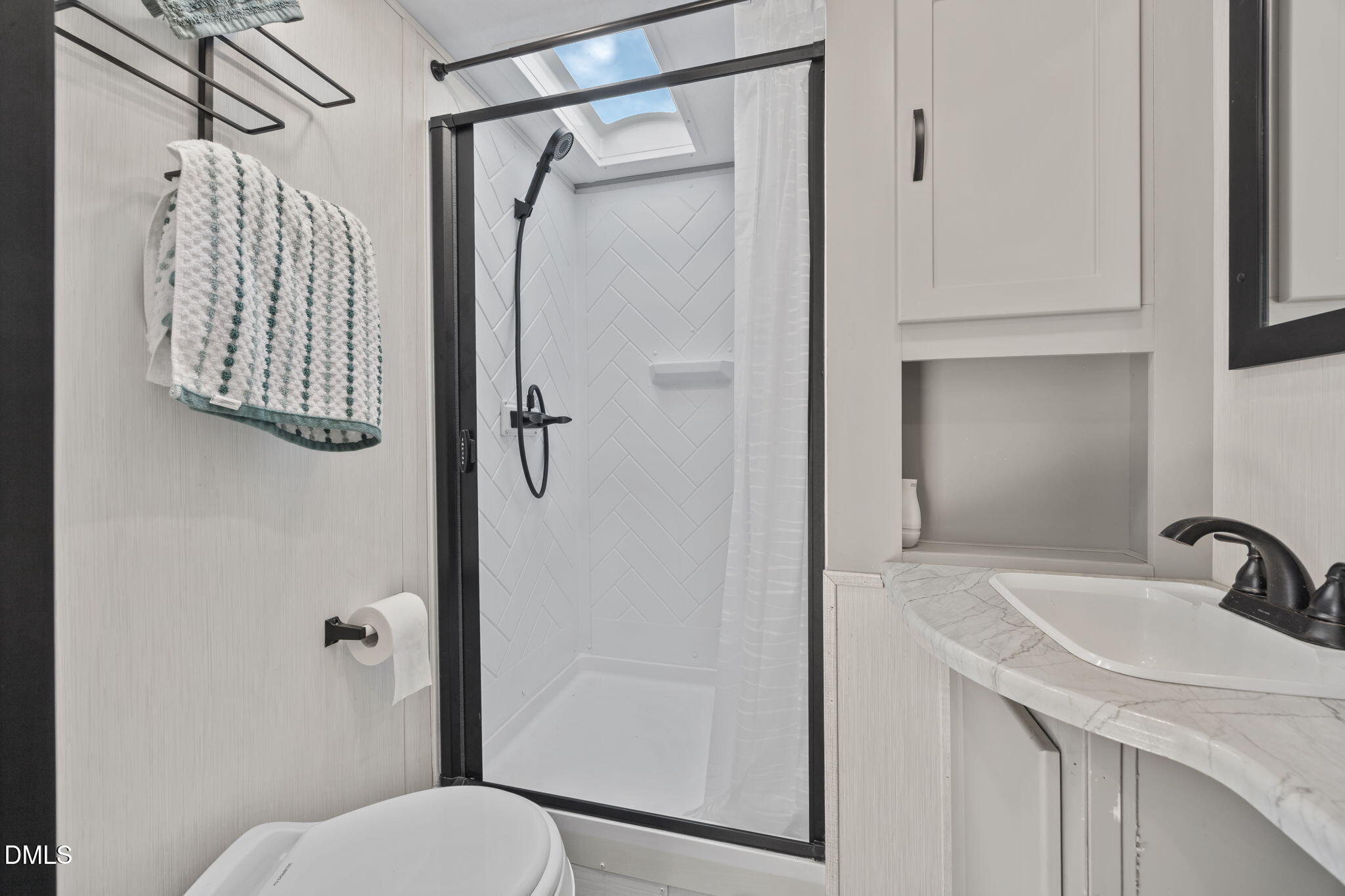 126 Kansas Drive Spring Hope, NC 27882 - Photo 16 of 31 a bathroom with a sink toilet and shower