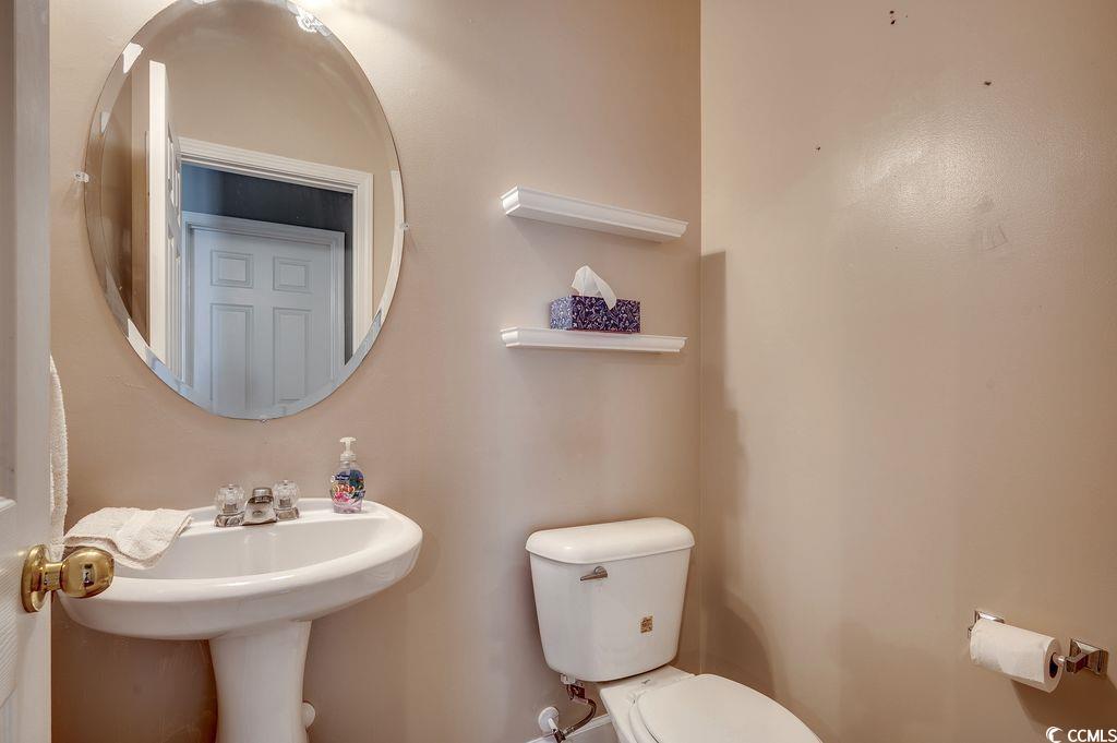 100 Culpepper Way, Unit 1002 Myrtle Beach, SC 29579 - Photo 11 of 39 Half bathroom featuring toilet