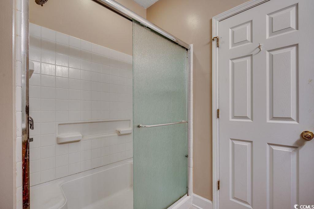 100 Culpepper Way, Unit 1002 Myrtle Beach, SC 29579 - Photo 16 of 39 Full bathroom with shower / bath combination with glass door