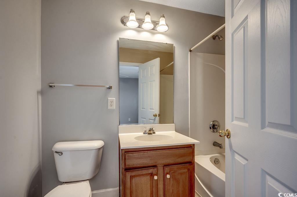 100 Culpepper Way, Unit 1002 Myrtle Beach, SC 29579 - Photo 23 of 39 Bathroom with washtub / shower combination and vanity