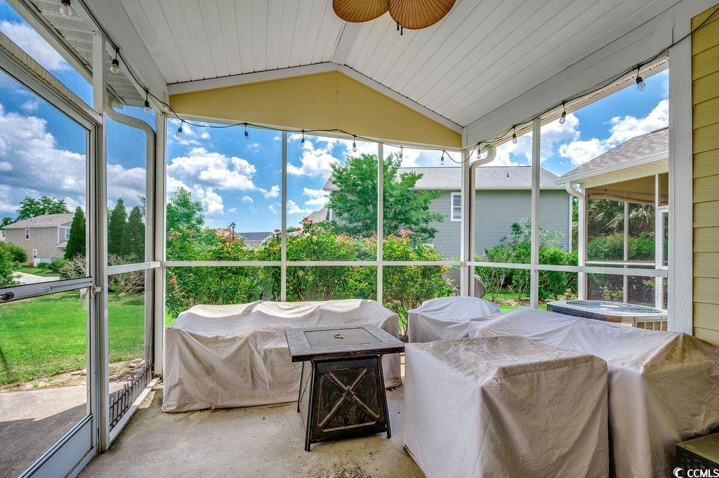 100 Culpepper Way, Unit 1002 Myrtle Beach, SC 29579 - Photo 25 of 39 Sunroom / solarium with ceiling fan and lofted ceiling