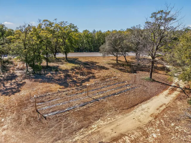 a view of a backyard of the house