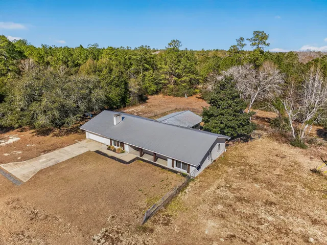 a view of a street with a building in the background