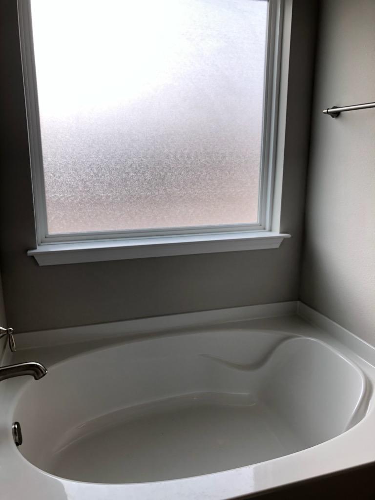 155 Stonegate Circle, Unit 69 Santa Rosa Beach, FL 32459 - Photo 23 of 31 a bathroom with a bathtub