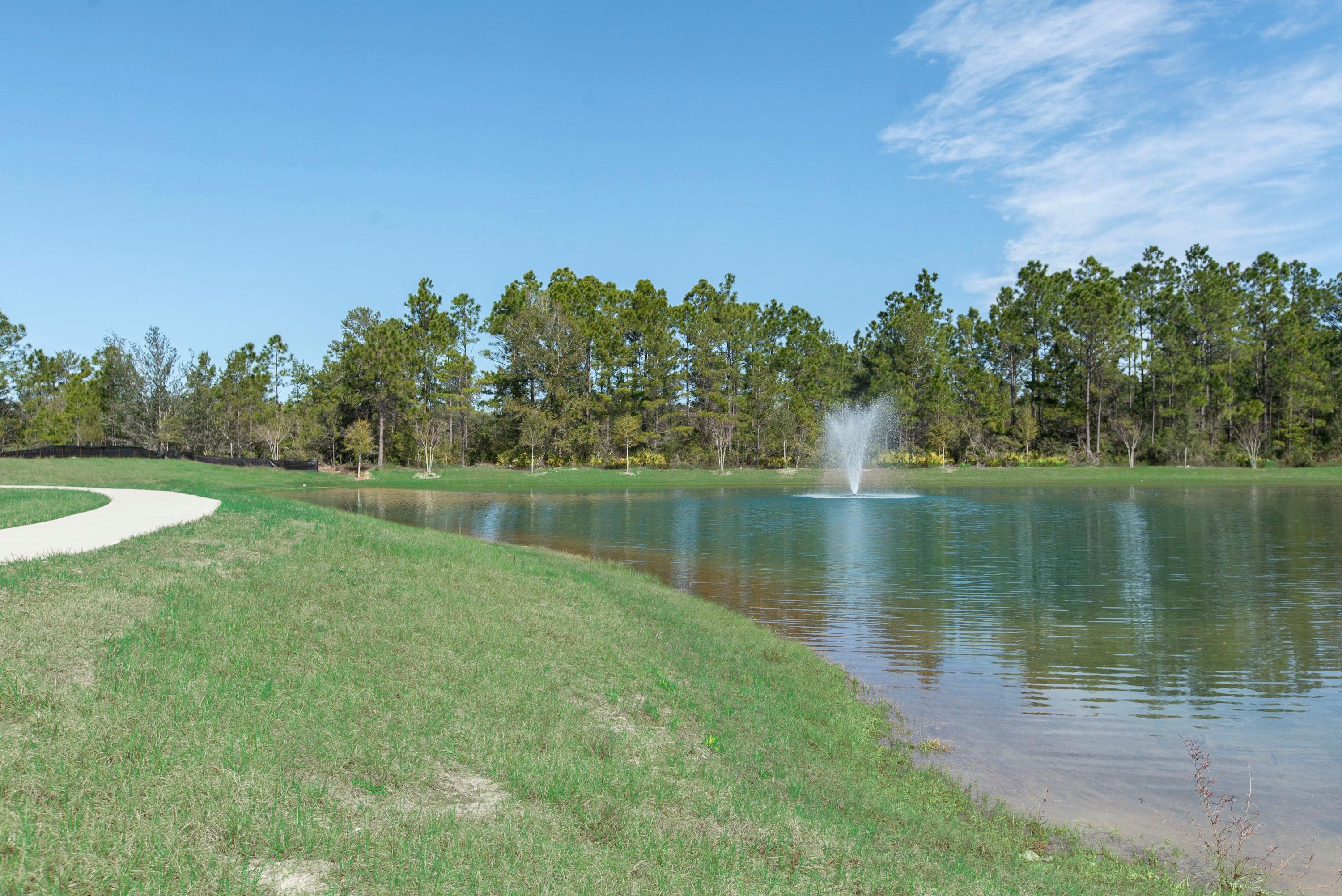155 Stonegate Circle, Unit 69 Santa Rosa Beach, FL 32459 - Photo 30 of 31 a view of a lake