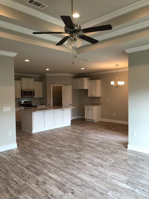 155 Stonegate Circle, Unit 69 Santa Rosa Beach, FL 32459 - Photo 5 of 31 a view of kitchen with a sink and a stove top oven