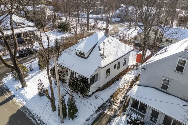 a view of a house with a roof deck