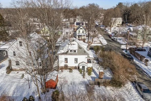 a view of house with yard