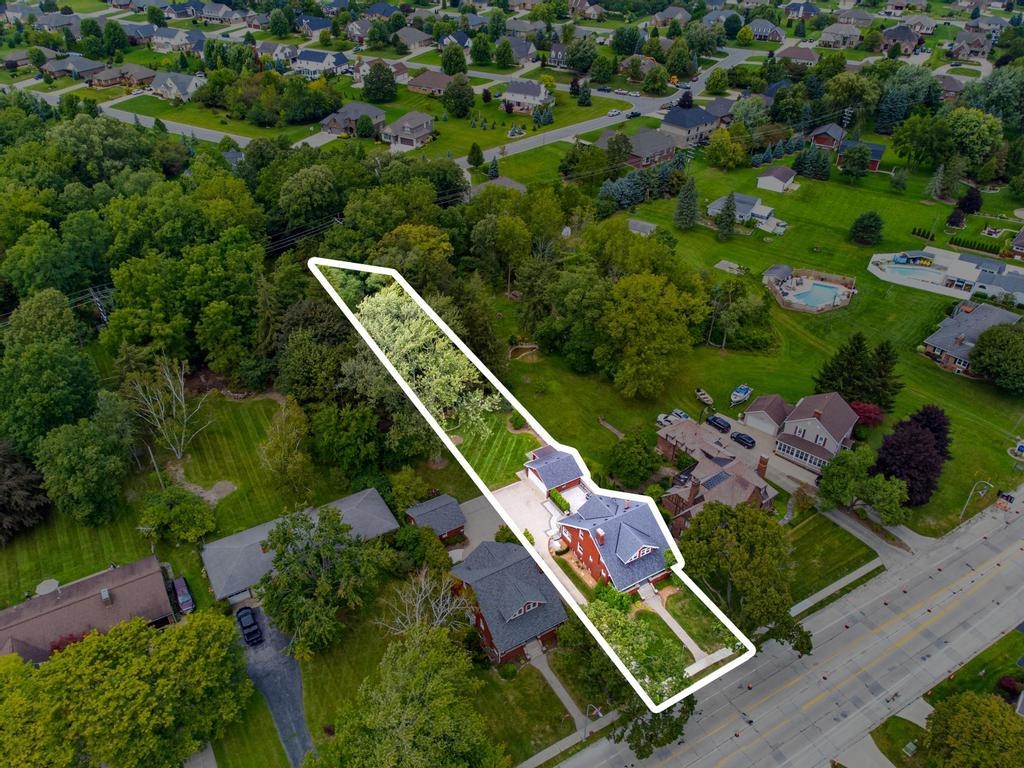 1059 North Riverside Avenue St. Clair, MI 48079 - Photo 21 of 27 Inground sprinklers keep your lawn lush, and the ADT alarm system provides peace of mind.