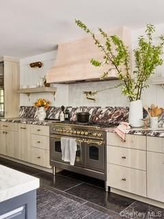 240 Eastwoods Road Pound Ridge, NY 10576 - Photo 15 of 46 a kitchen with a stove and cabinets