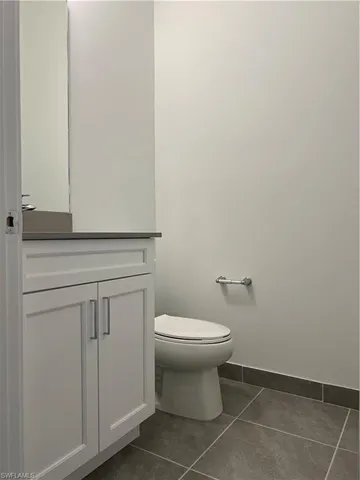 a bathroom with a toilet and a sink
