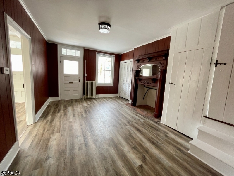 632 3rd Street Belvidere, NJ 07823 - Photo 5 of 11 wooden floor in an empty room with a window