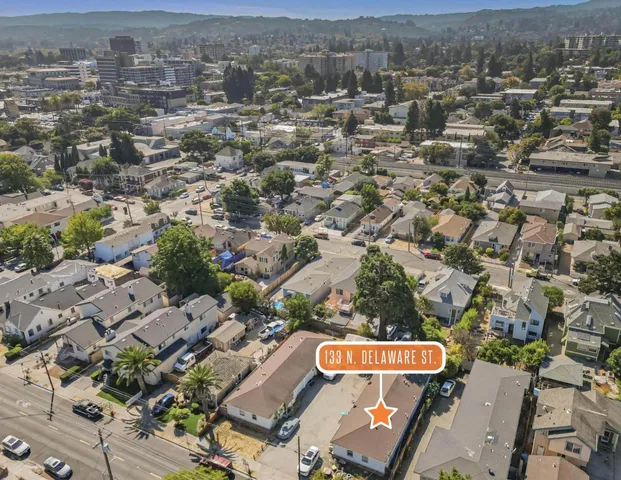 an aerial view of a city with lots of residential buildings