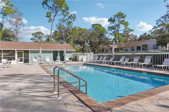 a view of a house with swimming pool