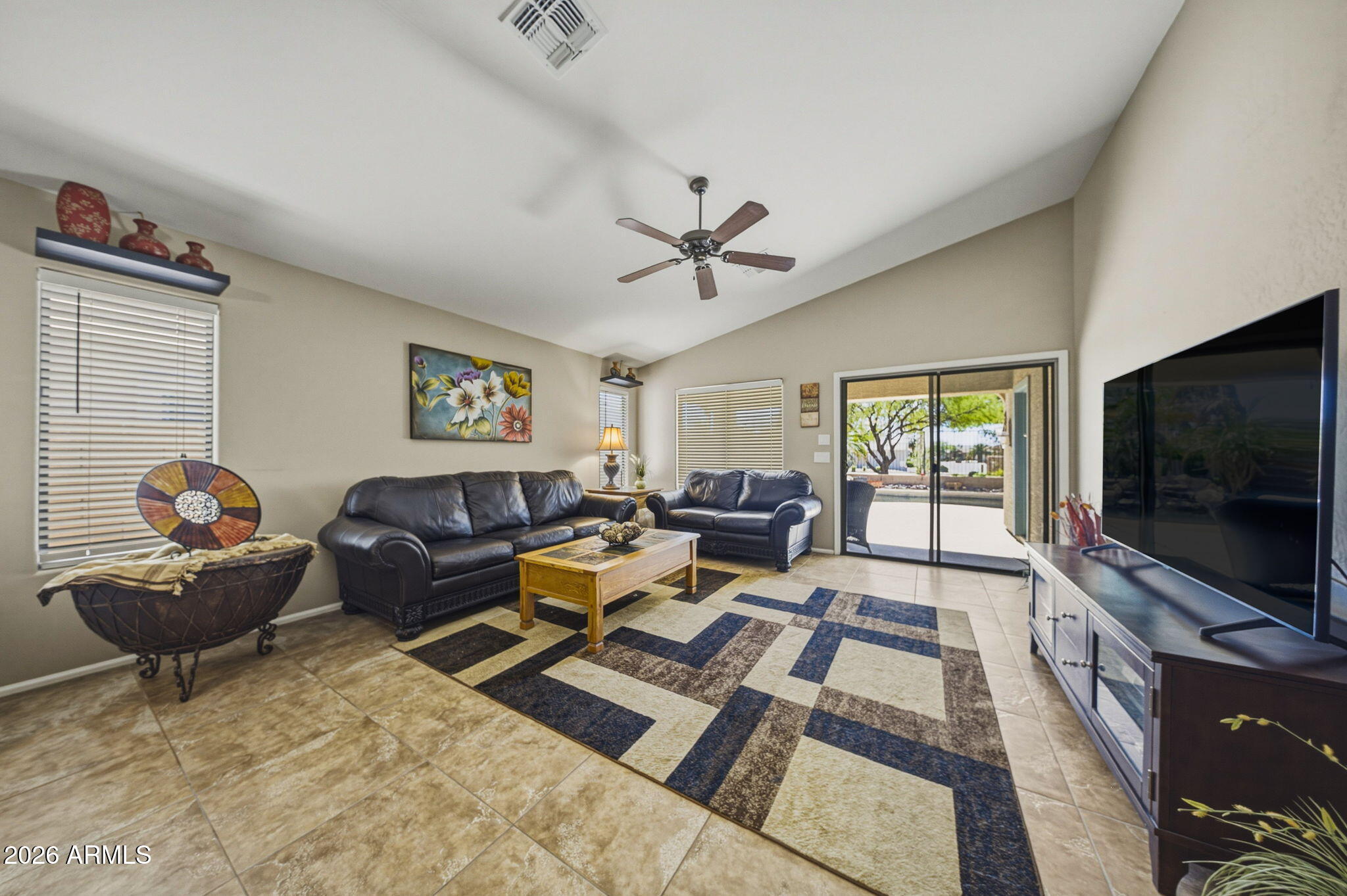 11 West Cooper Canyon Road San Tan Valley, AZ 85143 - Photo 12 of 31 a living room with furniture and a flat screen tv