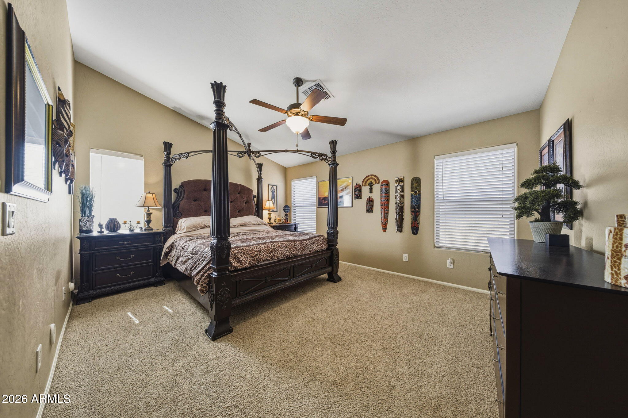 11 West Cooper Canyon Road San Tan Valley, AZ 85143 - Photo 14 of 31 a bedroom with a bed mirror and window