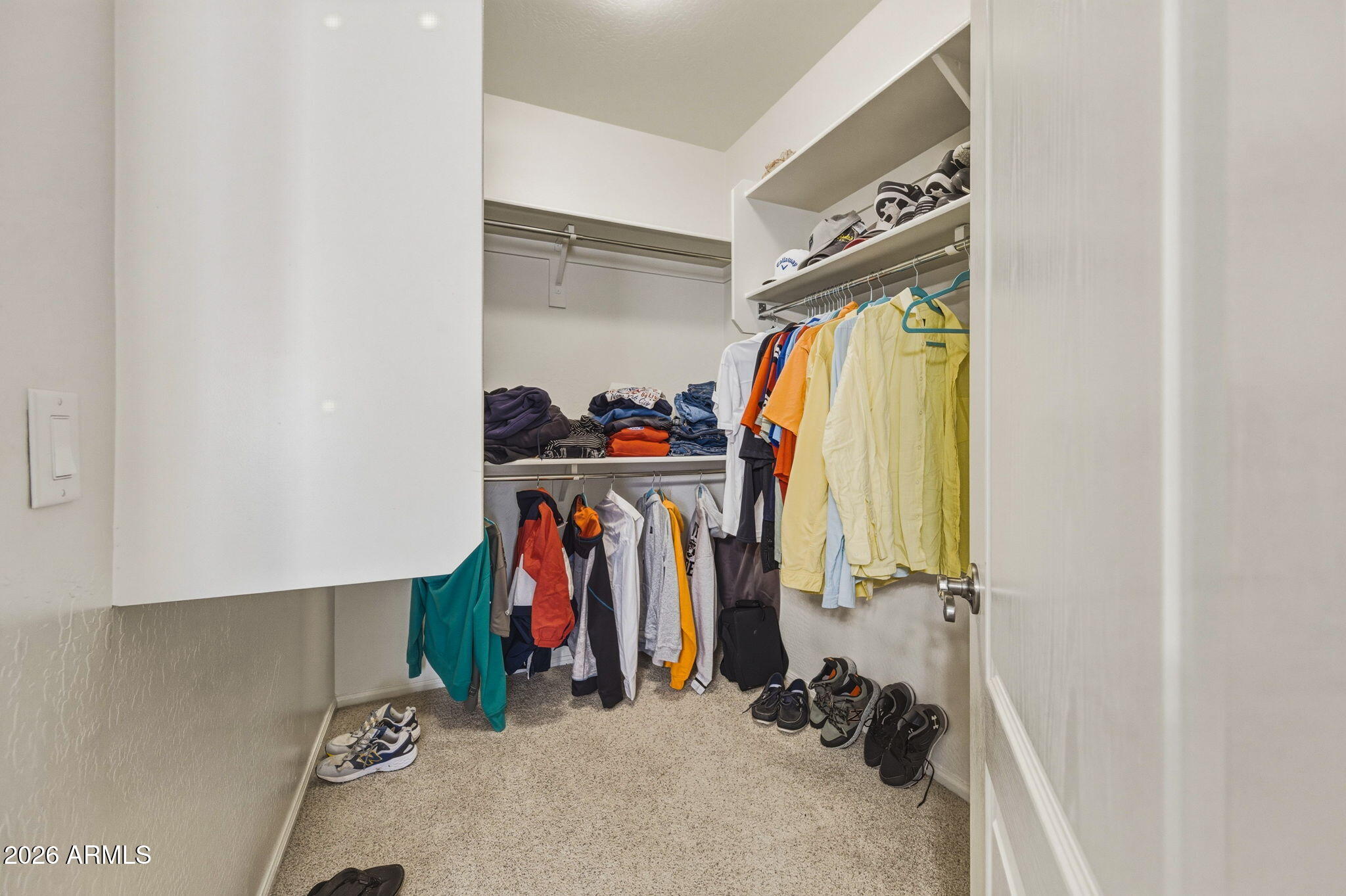 11 West Cooper Canyon Road San Tan Valley, AZ 85143 - Photo 18 of 31 a view of walk in closet with clothes