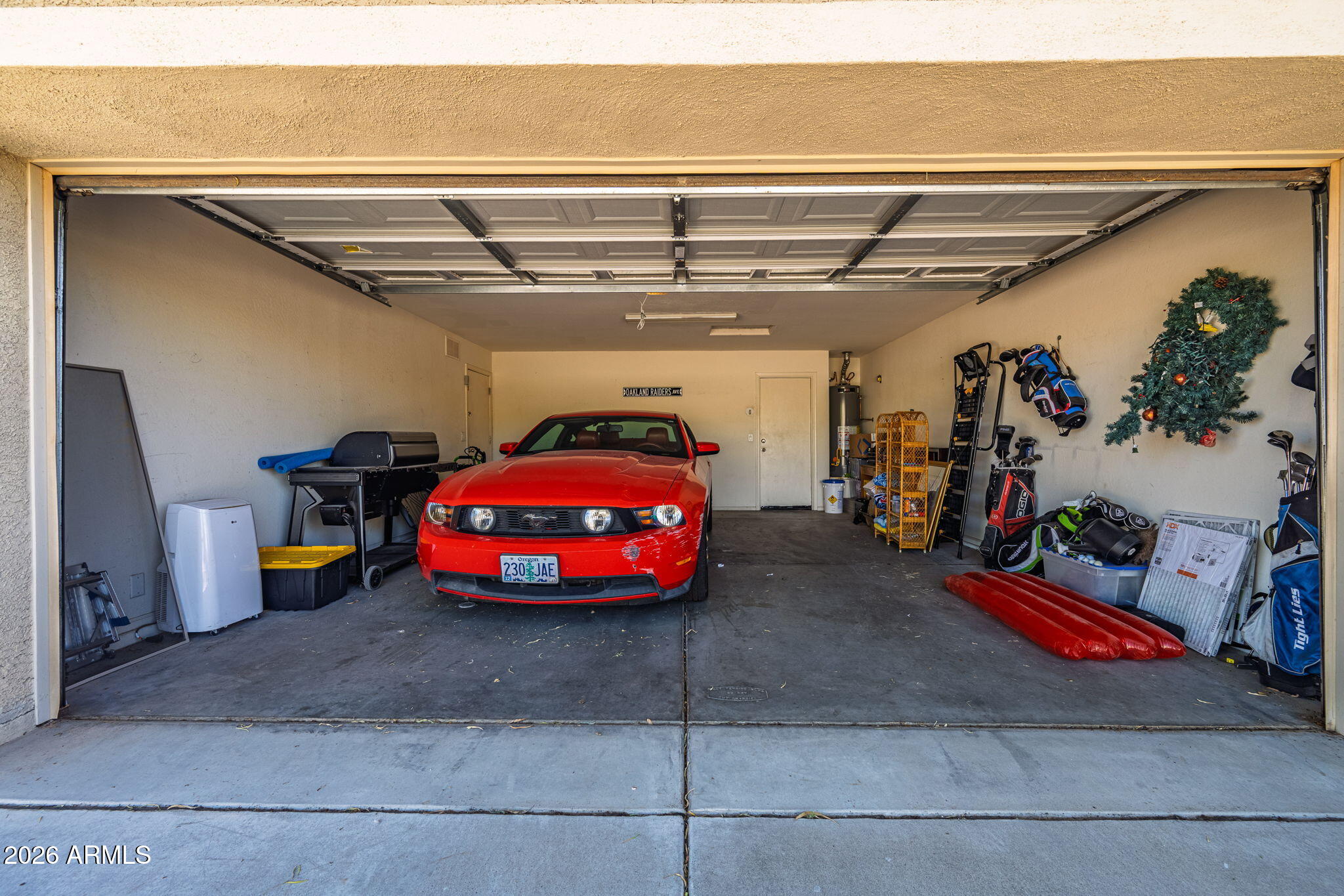 11 West Cooper Canyon Road San Tan Valley, AZ 85143 - Photo 24 of 31 a view of a garage with parked cars