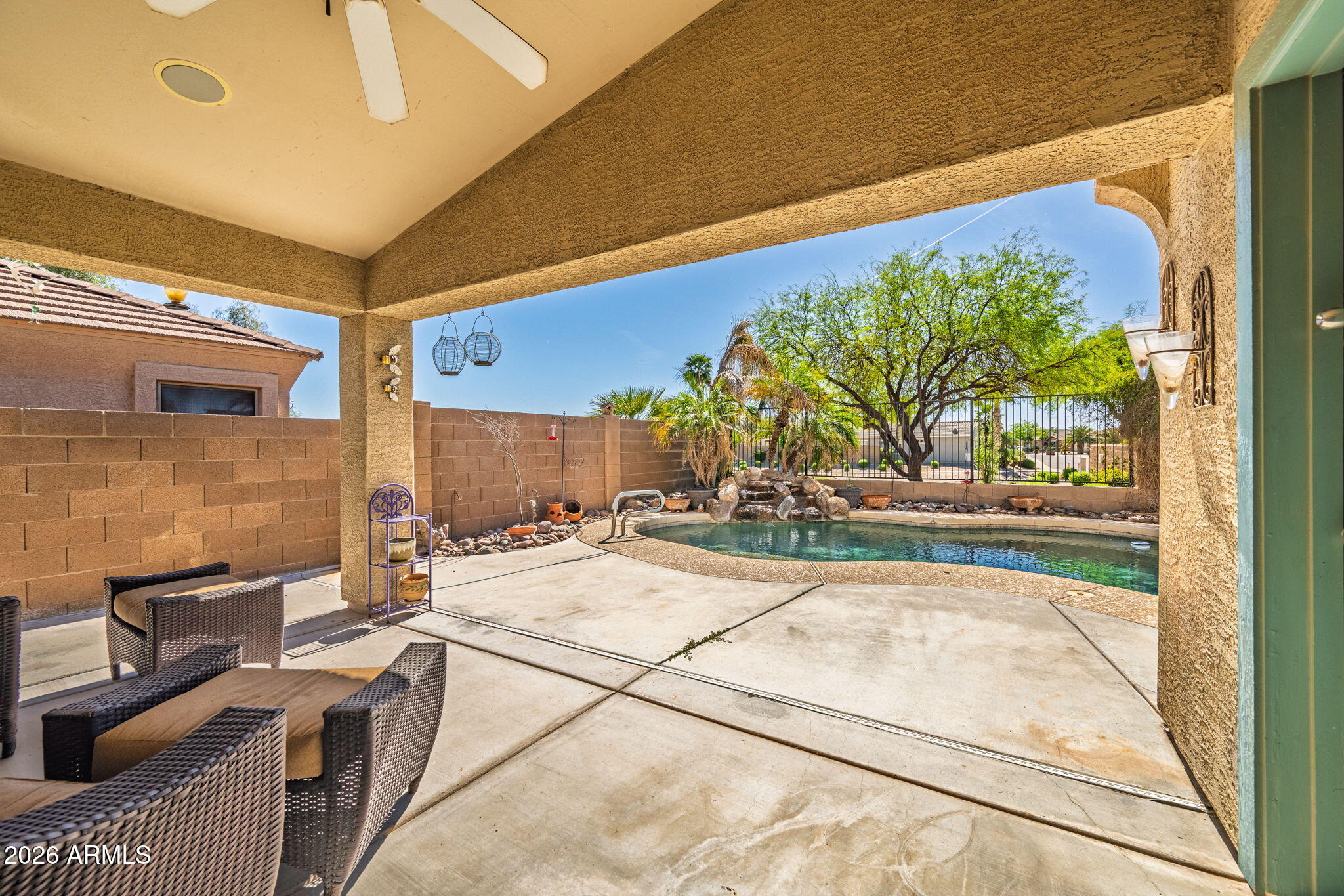 11 West Cooper Canyon Road San Tan Valley, AZ 85143 - Photo 25 of 31 a view of a patio with wooden fence