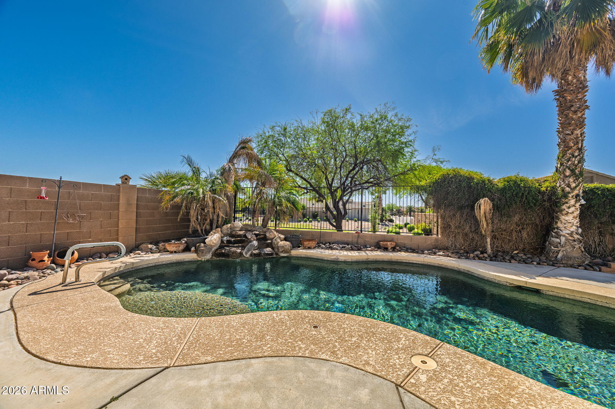 11 West Cooper Canyon Road San Tan Valley, AZ 85143 - Photo 26 of 31 a view of a swimming pool with a patio