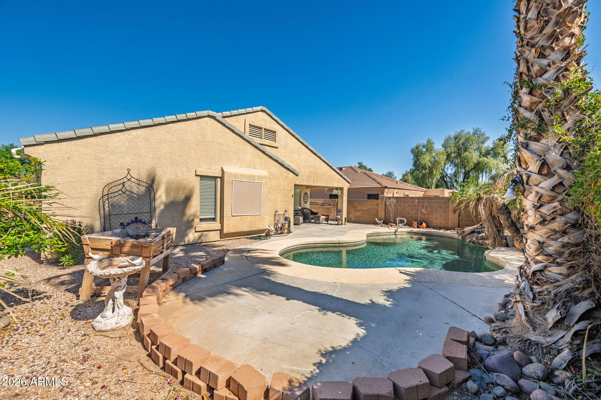 11 West Cooper Canyon Road San Tan Valley, AZ 85143 - Photo 27 of 31 a view of a house with backyard and sitting area