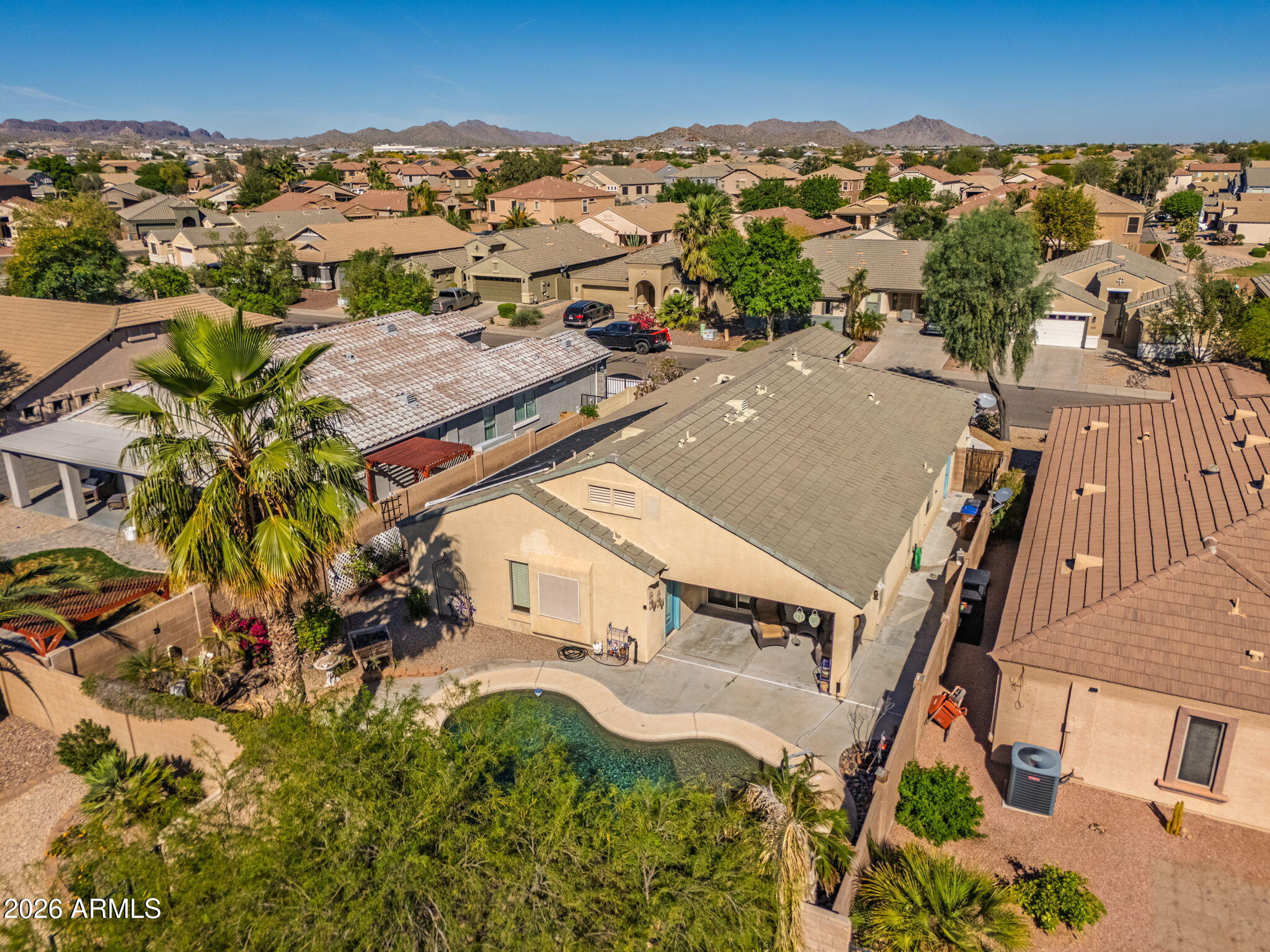 11 West Cooper Canyon Road San Tan Valley, AZ 85143 - Photo 28 of 31 an aerial view of residential houses with outdoor space and trees