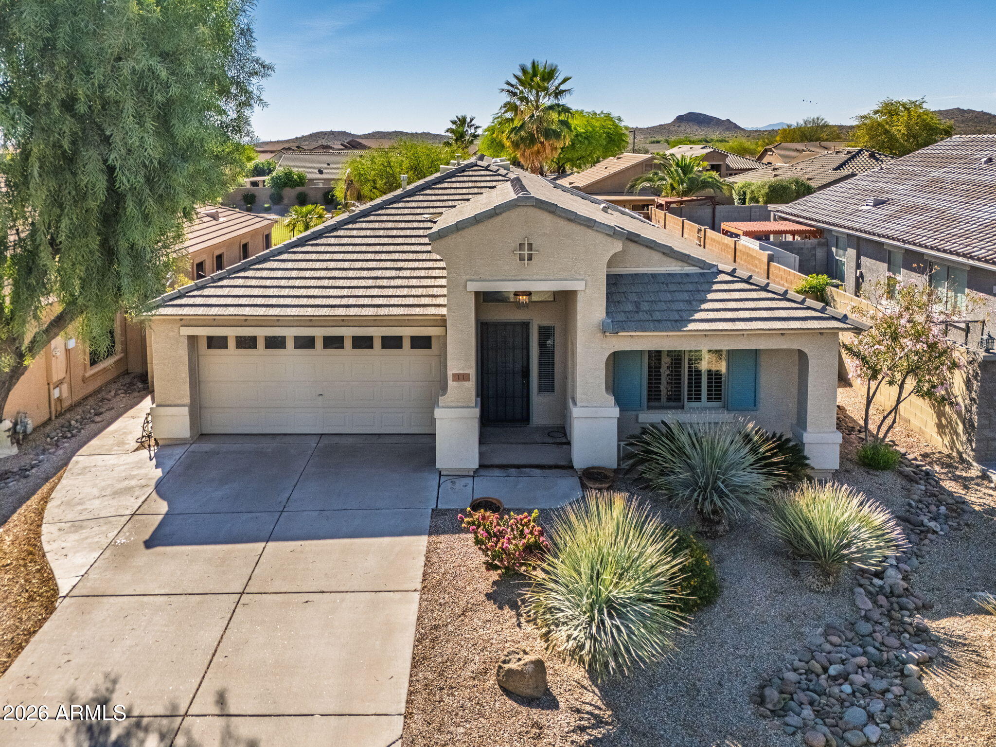 11 West Cooper Canyon Road San Tan Valley, AZ 85143 - Photo 2 of 31 a view of front of house with potted plants