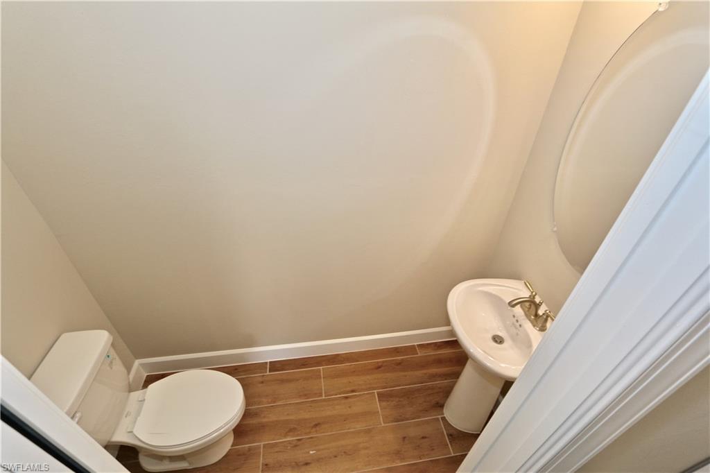 8437 Rosa Court Naples, FL 34114 - Photo 17 of 32 a close up of a toilet