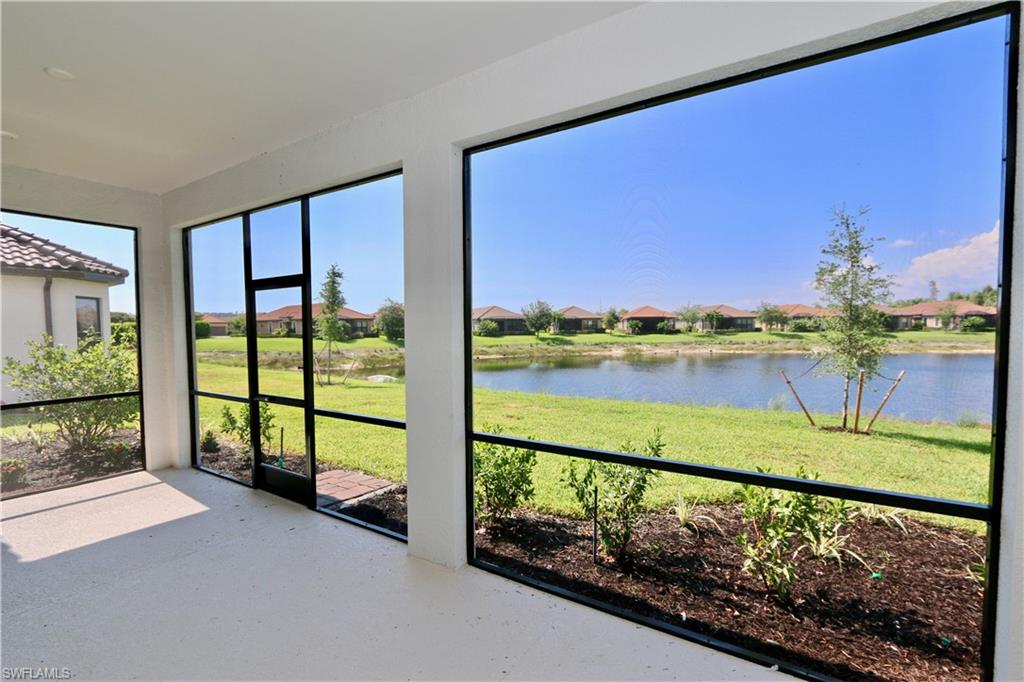 8437 Rosa Court Naples, FL 34114 - Photo 18 of 32 a view of ocean from a balcony