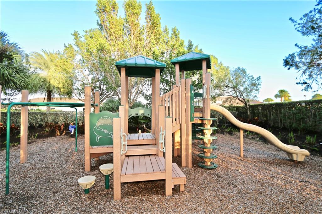 8437 Rosa Court Naples, FL 34114 - Photo 21 of 32 a view of outdoor space yard and patio
