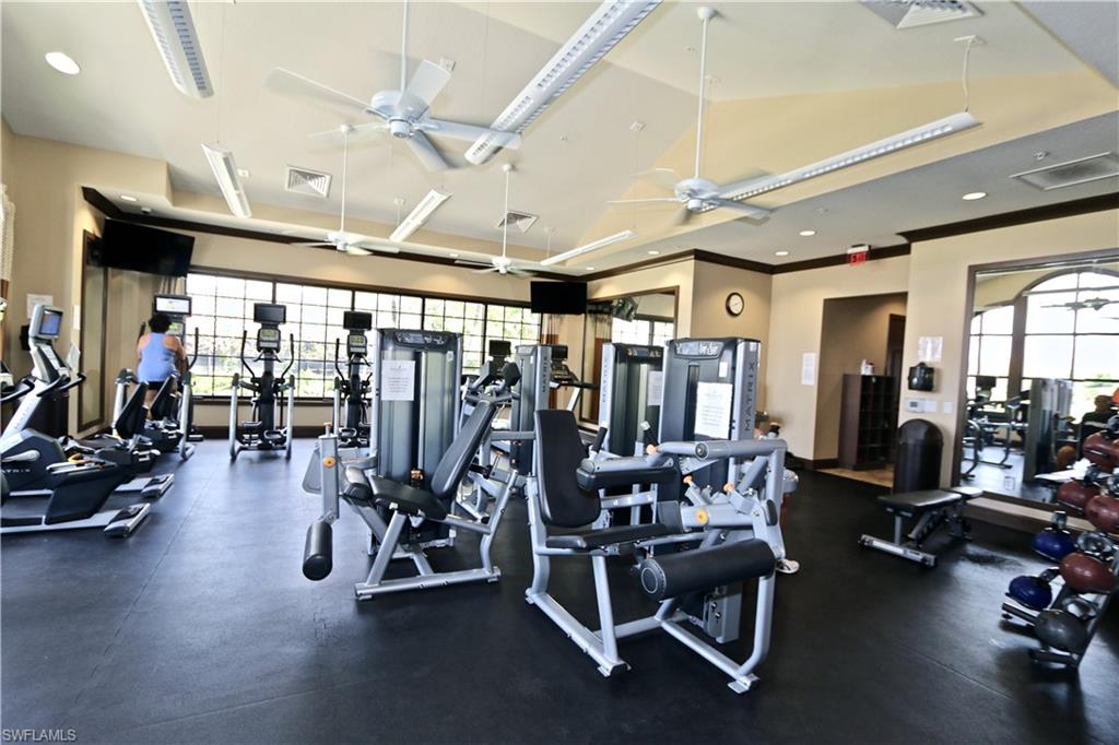 8437 Rosa Court Naples, FL 34114 - Photo 28 of 32 a view of a room with gym equipment