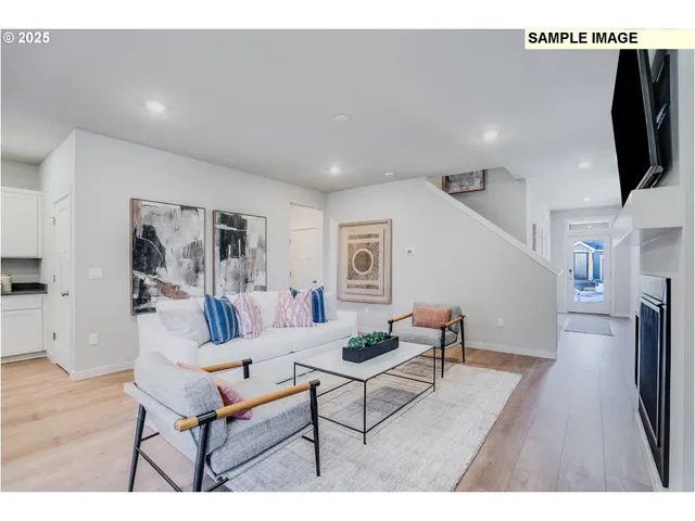 a bedroom with a bed a mirror and a window