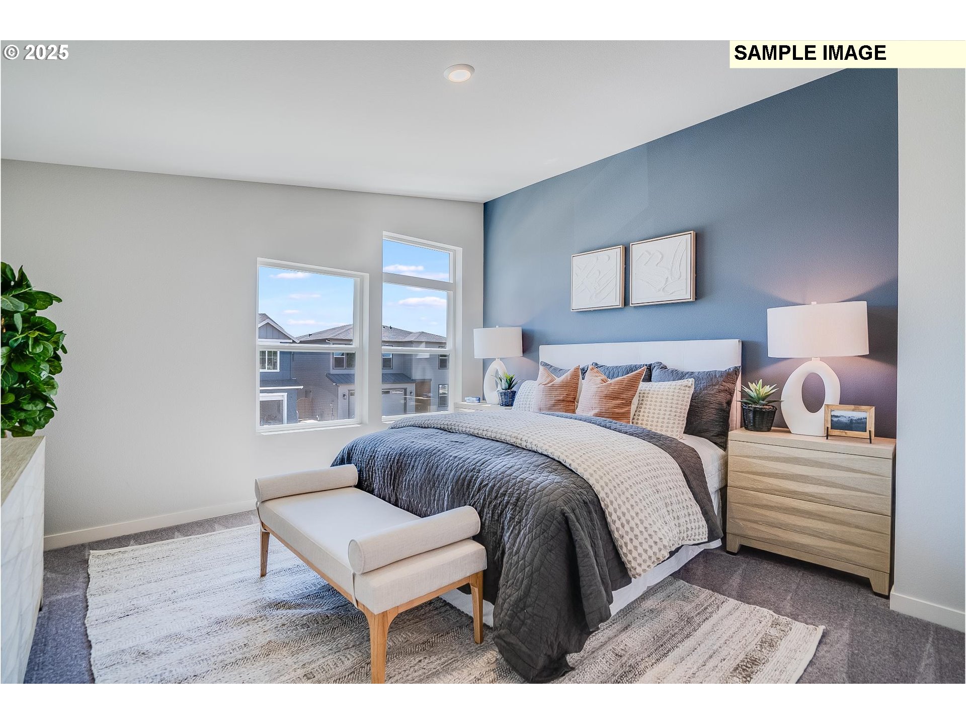 23809 Southwest Black Tortoise Terrace Tualatin, OR 97062 - Photo 12 of 26 a bedroom with a bed a mirror and a window