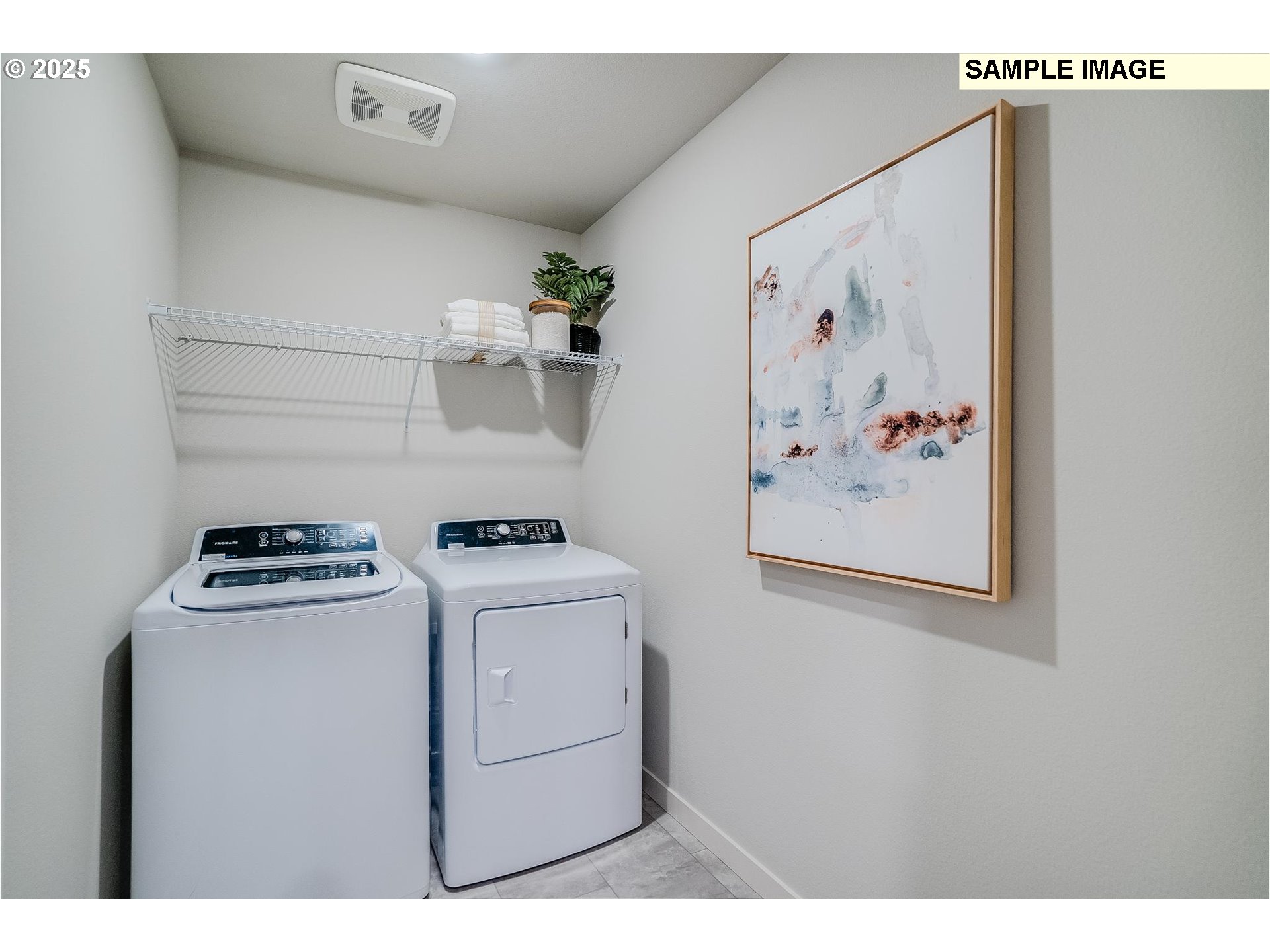 23809 Southwest Black Tortoise Terrace Tualatin, OR 97062 - Photo 24 of 26 a utility room with dryer and washer
