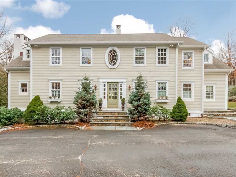 16 Locust Hill Road Darien, CT 06820 - Photo 1 of 25 front view of a house