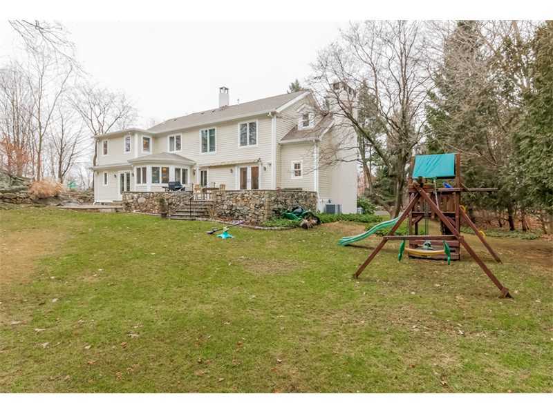 16 Locust Hill Road Darien, CT 06820 - Photo 21 of 25 a view of a house with a yard and sitting area