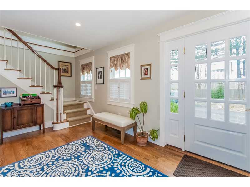 16 Locust Hill Road Darien, CT 06820 - Photo 3 of 25 a living room with furniture and a rug