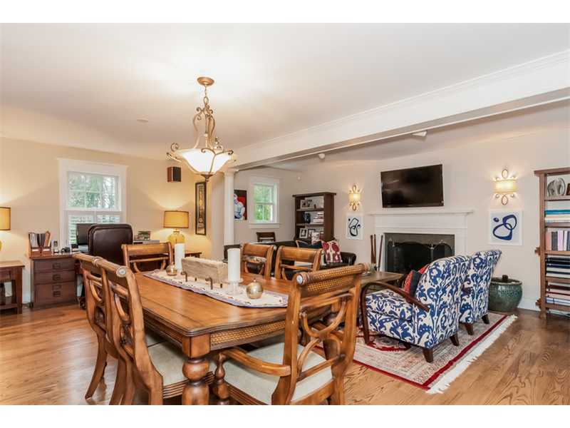 16 Locust Hill Road Darien, CT 06820 - Photo 5 of 25 a living room with fireplace a couch and a chandelier