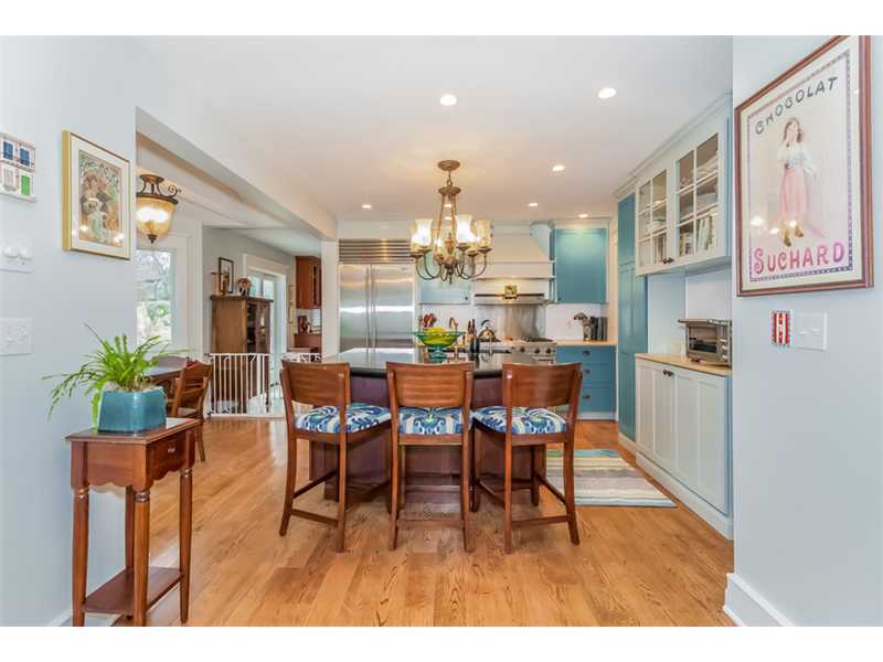 16 Locust Hill Road Darien, CT 06820 - Photo 6 of 25 a view of a dining room with furniture and a potted plant