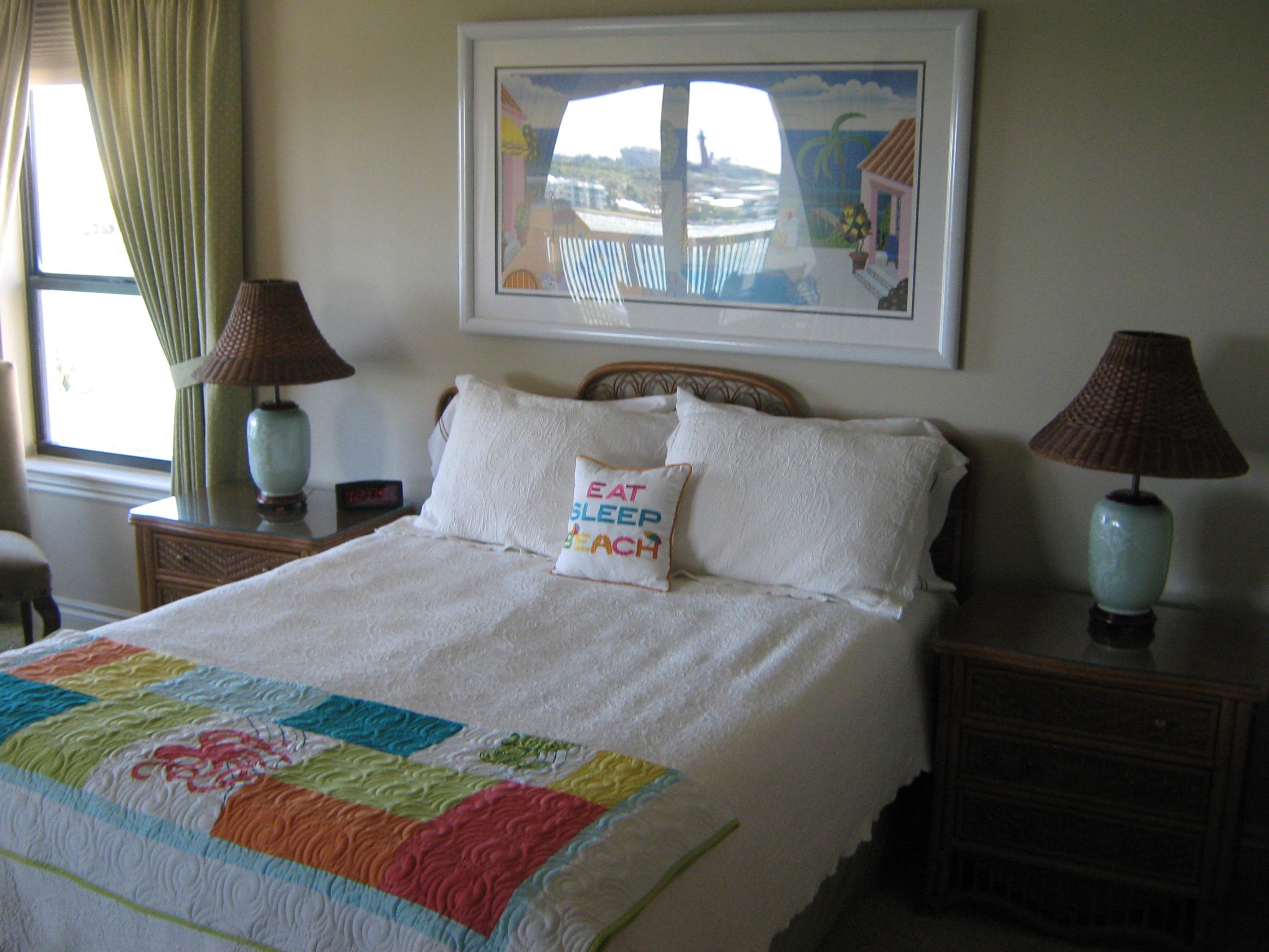19670 South Beach Road, Unit PHB4 Jupiter, FL 33469 - Photo 28 of 35 a bedroom with a bed and window